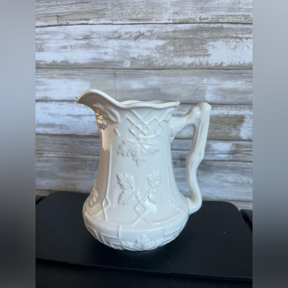 Peppertree Tabletops porcelain small pitcher. Lattice & vine pattern. 5 3/4 in.